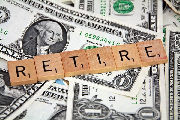 women and retirement planning+scrabble tiles