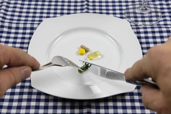 vitamins to take after age 50+pills-plate