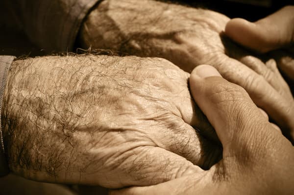 family caregiver+old-and-young-hands