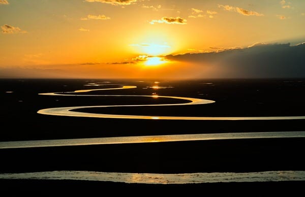 retirement transition+curved-stream-sunset