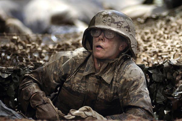 female vets with PTSD+female-soldier-in-mud